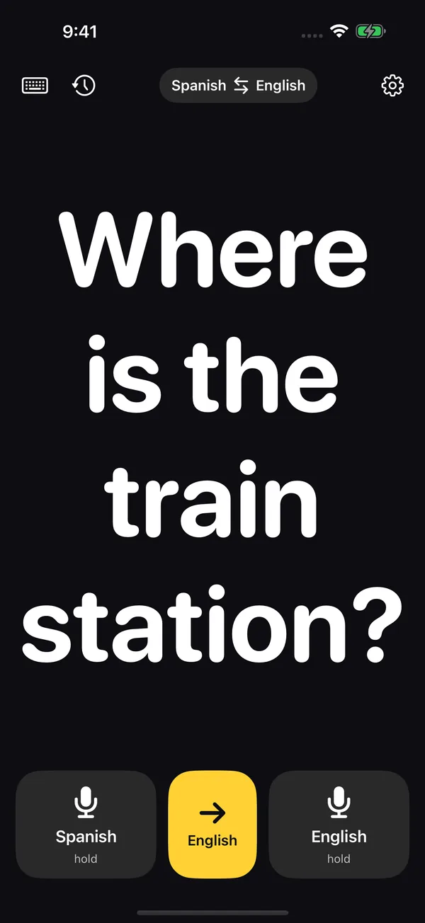 TraduMega main screen with “Where is the train station?” in giant type and the Spanish, English and translate buttons